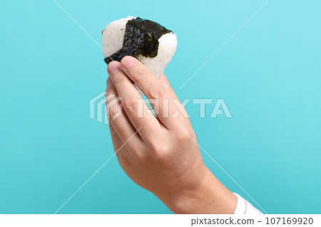Hand Holding Food 107169920