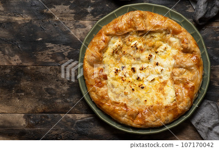 Homemade pie with cheese 107170042