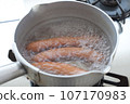 Scene of boiling three sausages, no chopsticks Scene of boiling three sausages, no chopsticks 107170983
