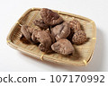 Shiitake mushrooms gathered in a colander, white background, can be cut out Shiitake mushrooms gathered in a colander, white background, can be cut out 107170992