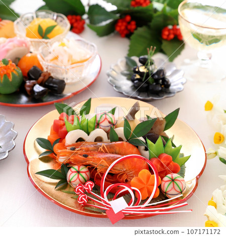 A gorgeous osechi dish for one person, served on a silver plum plate.A osechi dish for one person. A gorgeous osechi dish for one person, served on a silver plum plate.A osechi dish for one person. 107171172