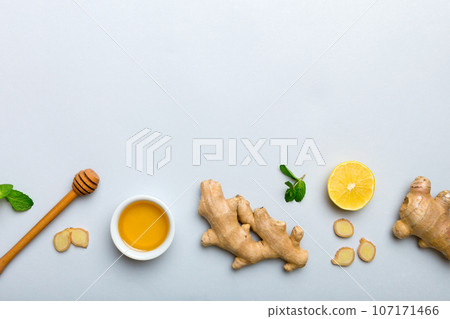 Natural cold and flu home remedies. Natural ingredients for immunity stimulation and viruses protection. top view flat lay Natural cold and flu home remedies. Natural ingredients for immunity stimulation and viruses protection. top view flat lay 107171466
