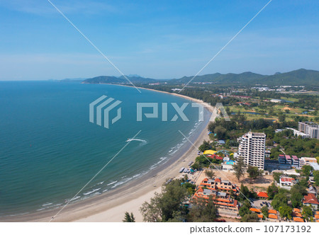 Aerial view of clear blue turquoise seawater, Andaman sea in Phuket island in summer season, Thailand. Water in ocean pattern texture wallpaper background. 107173192