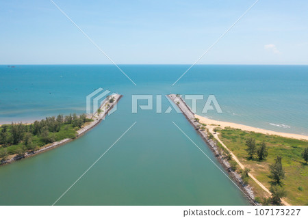 Aerial view of clear blue turquoise seawater, Andaman sea in Phuket island in summer season, Thailand. Water in ocean pattern texture wallpaper background. Aerial view of clear blue turquoise seawater, Andaman sea in Phuket island in summer season, Thailand. Water in ocean pattern texture wallpaper background. 107173227