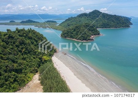 Aerial view of clear blue turquoise seawater, Andaman sea in Phuket island in summer season, Thailand. Water in ocean pattern texture wallpaper background. Aerial view of clear blue turquoise seawater, Andaman sea in Phuket island in summer season, Thailand. Water in ocean pattern texture wallpaper background. 107174017