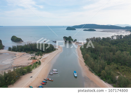 Aerial view of clear blue turquoise seawater, Andaman sea in Phuket island in summer season, Thailand. Water in ocean pattern texture wallpaper background. Aerial view of clear blue turquoise seawater, Andaman sea in Phuket island in summer season, Thailand. Water in ocean pattern texture wallpaper background. 107174800