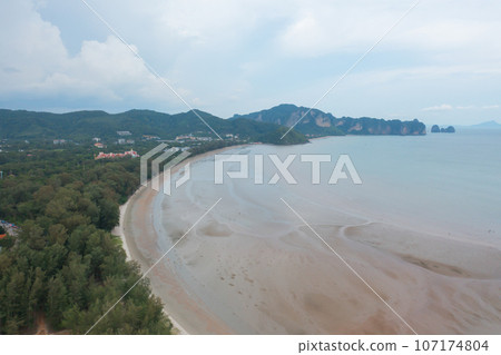 Aerial view of clear blue turquoise seawater, Andaman sea in Phuket island in summer season, Thailand. Water in ocean pattern texture wallpaper background. 107174804