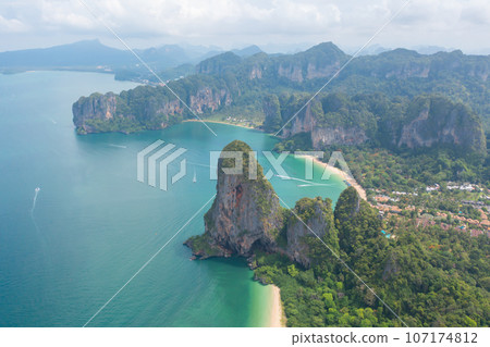 Aerial view of clear blue turquoise seawater, Andaman sea in Phuket island in summer season, Thailand. Water in ocean pattern texture wallpaper background. Aerial view of clear blue turquoise seawater, Andaman sea in Phuket island in summer season, Thailand. Water in ocean pattern texture wallpaper background. 107174812