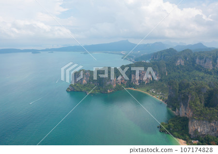 Aerial view of clear blue turquoise seawater, Andaman sea in Phuket island in summer season, Thailand. Water in ocean pattern texture wallpaper background. 107174828