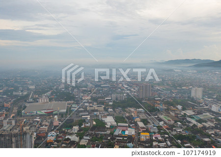 Aerial view of residential neighborhood roofs. Urban housing development from above. Top view. Real estate in Phuket, southern province city, Thailand. Property real estate. 107174919