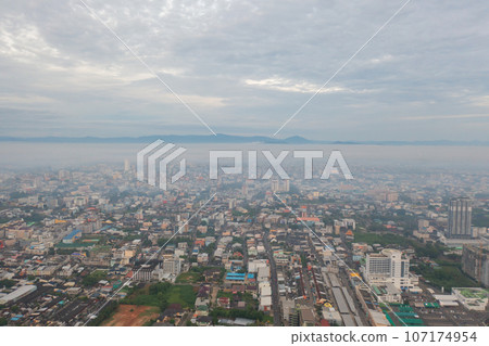 Aerial view of residential neighborhood roofs. Urban housing development from above. Top view. Real estate in Phuket, southern province city, Thailand. Property real estate. 107174954