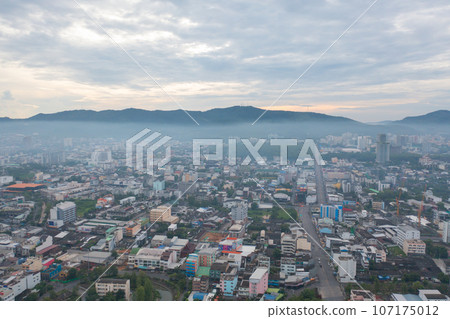 Aerial view of residential neighborhood roofs. Urban housing development from above. Top view. Real estate in Phuket, southern province city, Thailand. Property real estate. Aerial view of residential neighborhood roofs. Urban housing development from above. Top view. Real estate in Phuket, southern province city, Thailand. Property real estate. 107175012