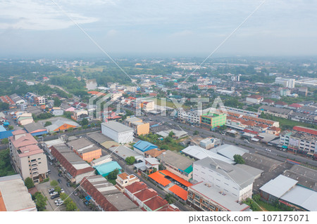 Aerial view of residential neighborhood roofs. Urban housing development from above. Top view. Real estate in Phuket, southern province city, Thailand. Property real estate. 107175071