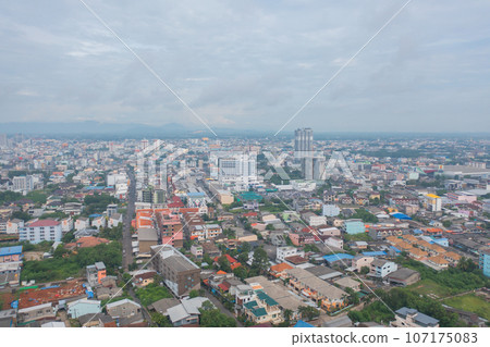 Aerial view of residential neighborhood roofs. Urban housing development from above. Top view. Real estate in Phuket, southern province city, Thailand. Property real estate. 107175083