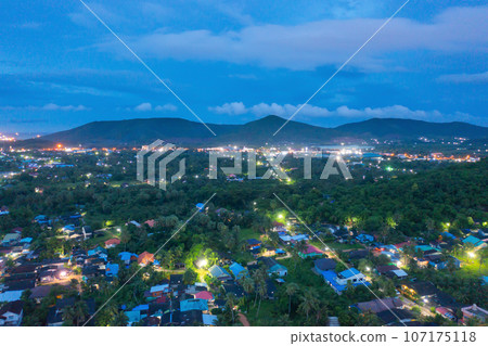 Aerial view of residential neighborhood roofs. Urban housing development from above. Top view. Real estate in Phuket, southern province city, Thailand. Property real estate. 107175118