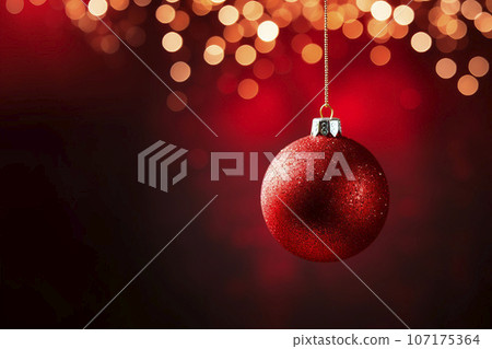 red Christmas ball on a bright background.  red Christmas ball on a bright background.  107175364