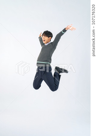 Male student jumping (cutout PNG also available! See author link) Male student jumping (cutout PNG also available! See author link) 107176320