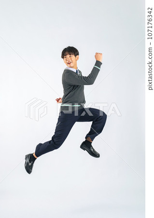 Male student jumping (cutout PNG also available! See author link) Male student jumping (cutout PNG also available! See author link) 107176342