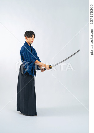 Boy holding a sword, samurai, martial arts (cutout PNG is also on sale! See author link) 107176366
