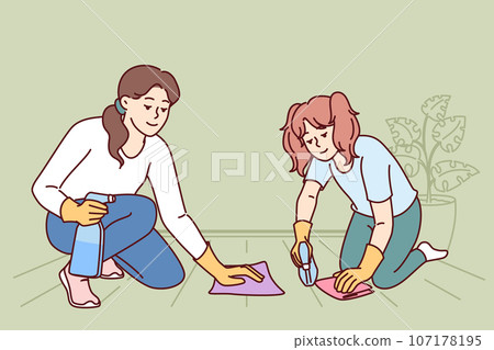 Mom and daughter are cleaning apartment together and washing floor using stain remover sprayer 107178195