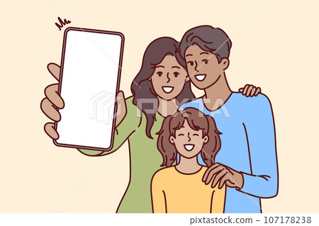 Happy family holds phone with blank screen in hands, offering to use advertising mobile application 107178238