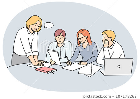 Businesspeople discuss paperwork at meeting 107178262