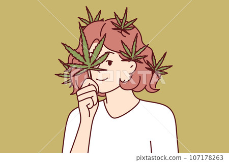 Woman with cannabis petals on face and hair calls for legalization of marijuana for medical purposes Woman with cannabis petals on face and hair calls for legalization of marijuana for medical purposes 107178263