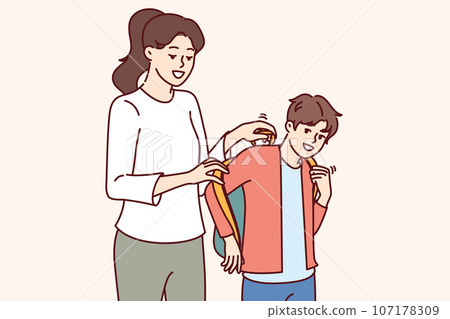 Mother helps son get ready for school and put on backpack with textbooks and office supplies Mother helps son get ready for school and put on backpack with textbooks and office supplies 107178309
