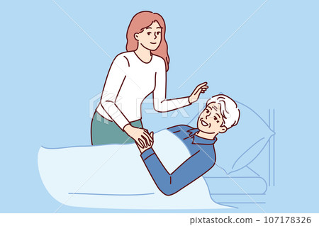 Daughter visits old bedridden father and takes care of gray-haired man in hospital after operation Daughter visits old bedridden father and takes care of gray-haired man in hospital after operation 107178326