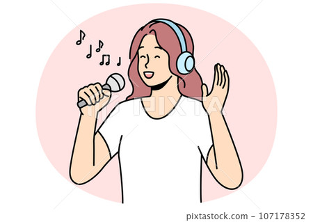 Happy woman singing in microphone 107178352