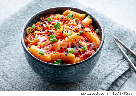 Rabokki, tteokbokki or topokki with ramen, Korean street food, spicy rice cakes Rabokki, tteokbokki or topokki with ramen, Korean street food, spicy rice cakes 107178535