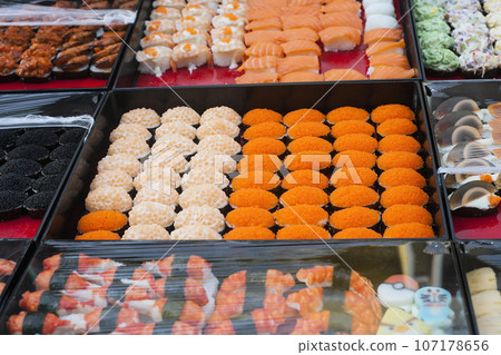 Different sushi with caviar on street market, Phuket, Thailand 107178656