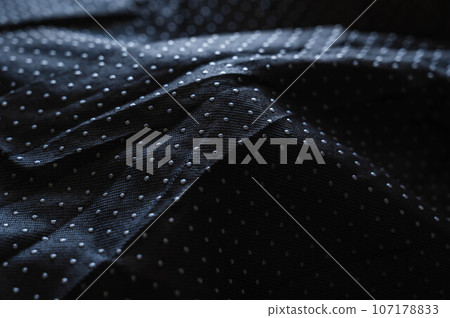 Anti-slip fabric with polka dots 107178833