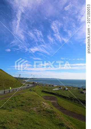 Sunset overlooking Rishiri Island offshore from the Sarobetsu wilderness in Rishiri Rebun-Sarobetsu National Park, Hokkaido, Japan's largest high-rise wetland 107180053