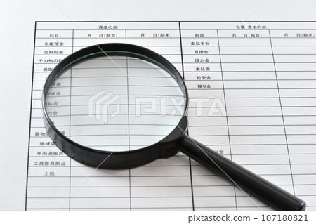 Image of looking at a balance sheet Image of looking at a balance sheet 107180821
