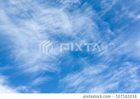 Blue sky background with cumulus clouds 107182038