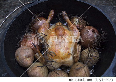 Image of camping dutch oven roast chicken 107182075