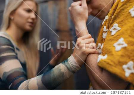 Gen Z couple having an argument outdoors in the city. Gen Z couple having an argument outdoors in the city. 107187191