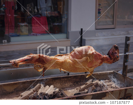 Traditional food - The Soulva. popular Greek custom especially connected with celebration of Easter and Assumption of Virgin. Includes skewering whole lamb or goat cooked over charcoal rotisserie. Traditional food - The Soulva. popular Greek custom especially connected with celebration of Easter and Assumption of Virgin. Includes skewering whole lamb or goat cooked over charcoal rotisserie. 107187877