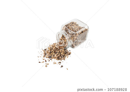 Bistorta officinalis known as bistort, common bistort, European bistort or meadow bistort falling from glass jar isolated on white background. 107188928