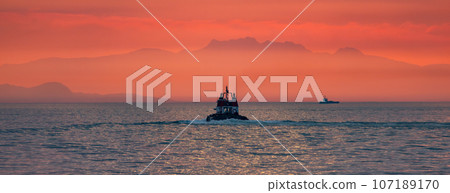 Boat on the West Coast of Pacific Ocean. Vancouver, BC, Canada. Colorful Sunset. 107189170