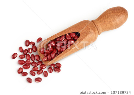 Red adzuki beans in wooden scoop isolated on white background. Top view. Flat lay. Red adzuki beans in wooden scoop isolated on white background. Top view. Flat lay. 107189724
