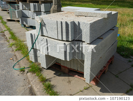 Pallets Paving Slabs on Europe Streets, Paving of the Pedestrian Path, Road Repair, Modern Technologies Pallets Paving Slabs on Europe Streets, Paving of the Pedestrian Path, Road Repair, Modern Technologies 107190123