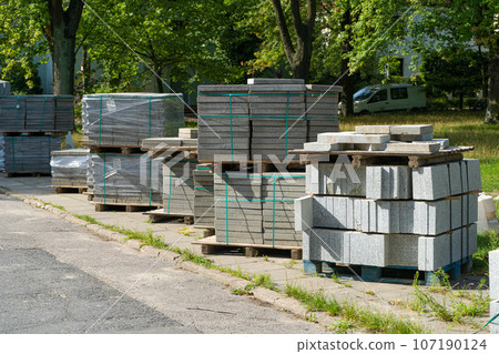 Pallets Paving Slabs on Europe Streets, Paving of the Pedestrian Path, Road Repair, Modern Technologies 107190124