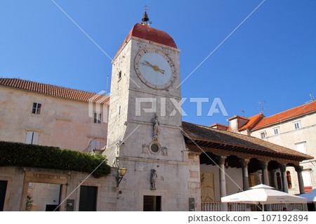 Trogir, a world cultural heritage site in Croatia, the Adriatic island, the landmark clock tower next to the town hall 107192894