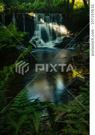 Waterfall near the river beach of Mamoa Waterfall near the river beach of Mamoa 107193638