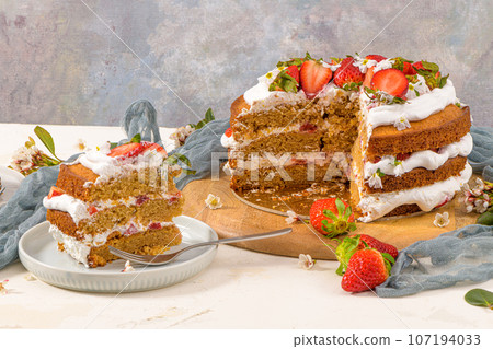 Sponge cake with fresh strawberries Sponge cake with fresh strawberries 107194033