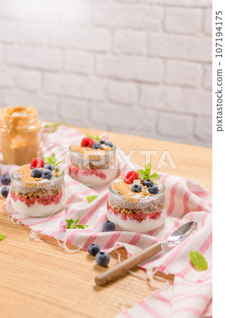 Chia pudding with oat and berries 107194175