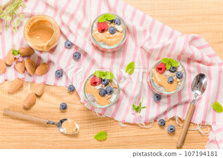 Chia pudding with oat and berries 107194181