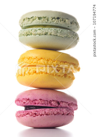 Three macaroons standing on top of each other 107194774